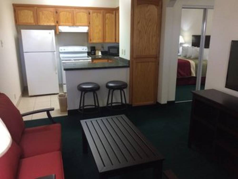 TRAVEL INN AND SUITES 9