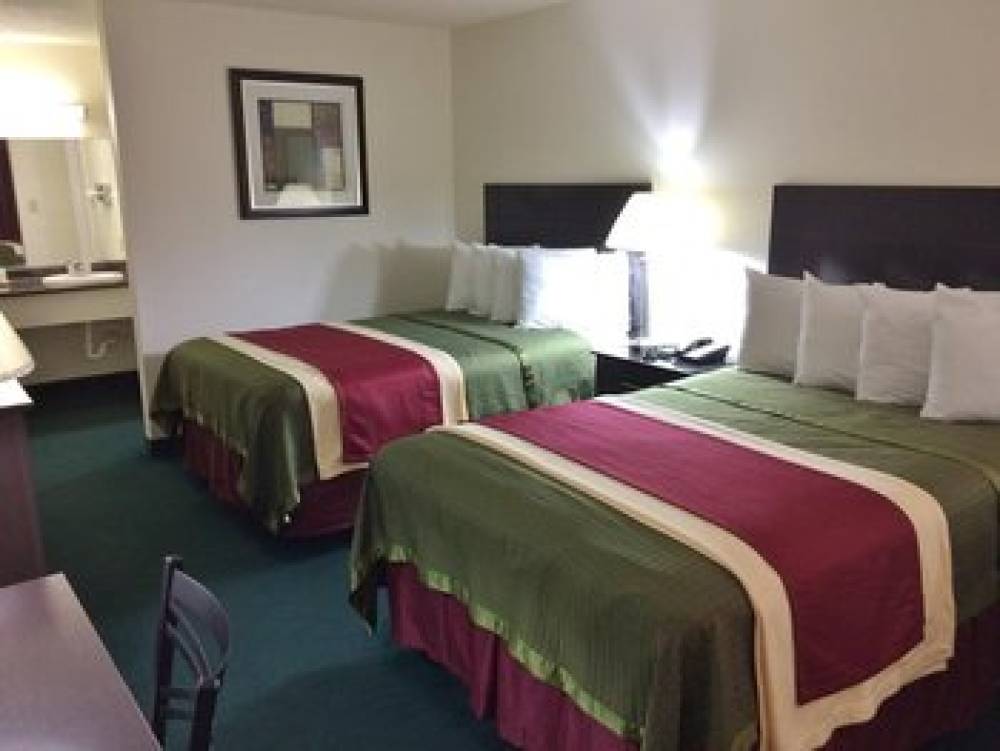 TRAVEL INN AND SUITES 2