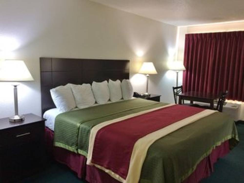 TRAVEL INN AND SUITES 4